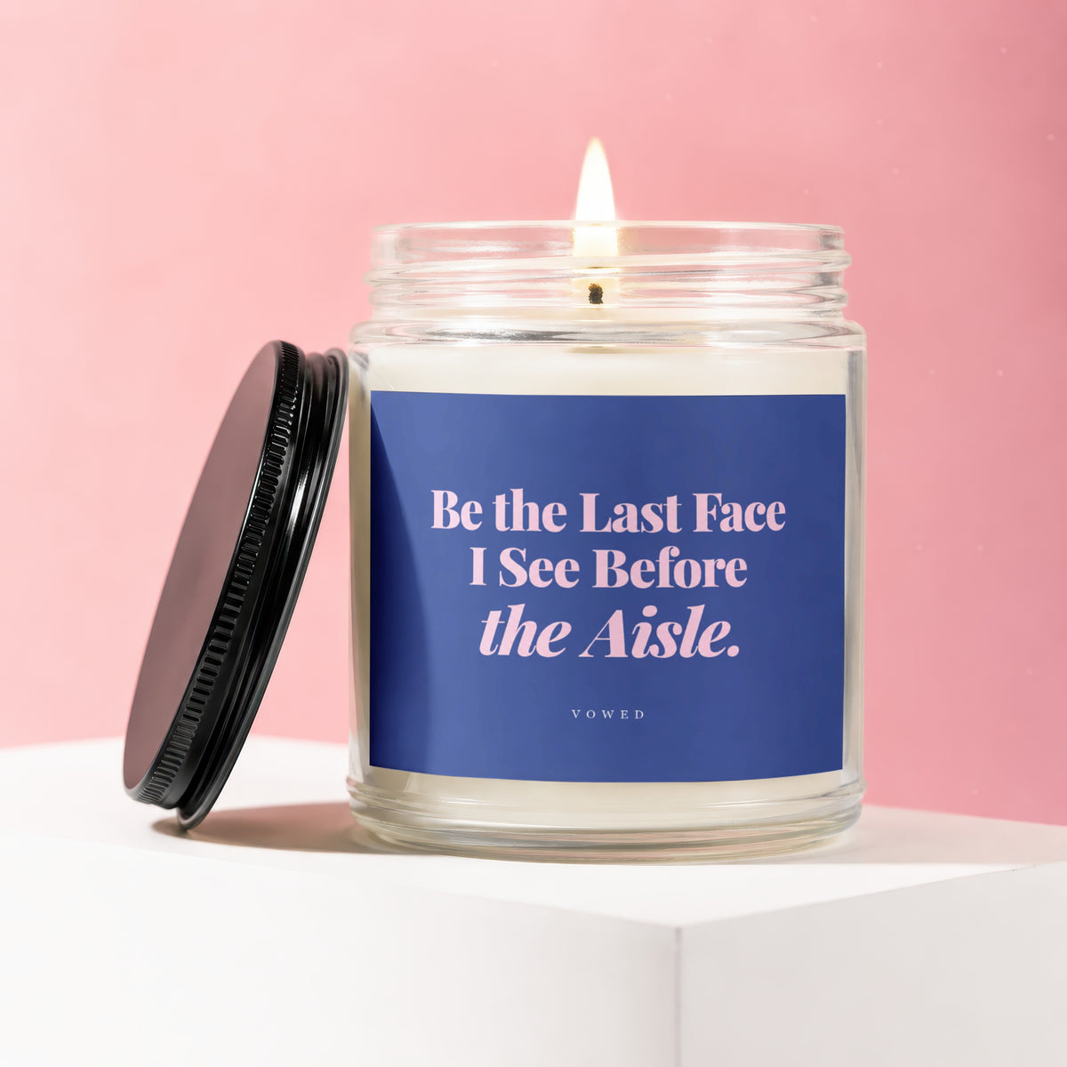 Candle with label reading "Be the Last Face I See Before the Aisle. VOWED."
