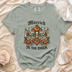 Green t-shirt with "Married In The Dark" text and moth graphic.