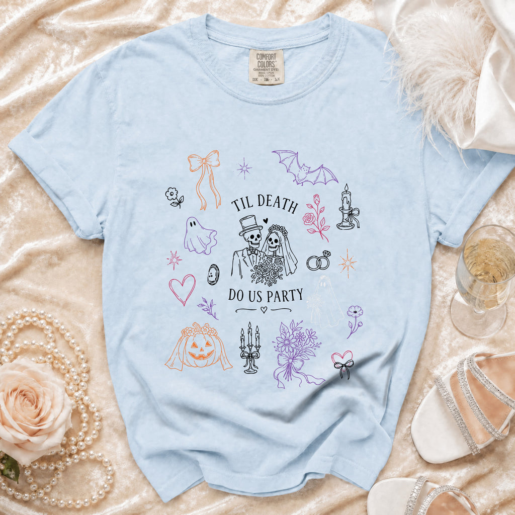 Light blue t-shirt with "Til Death Do Us Party" skeleton bride and groom graphic.