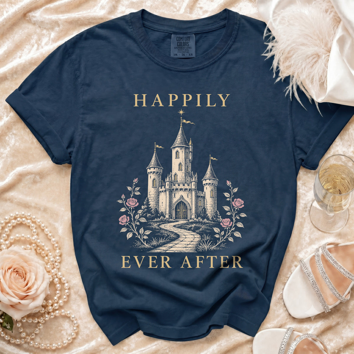 Navy t-shirt with a castle graphic and text "Happily Ever After".