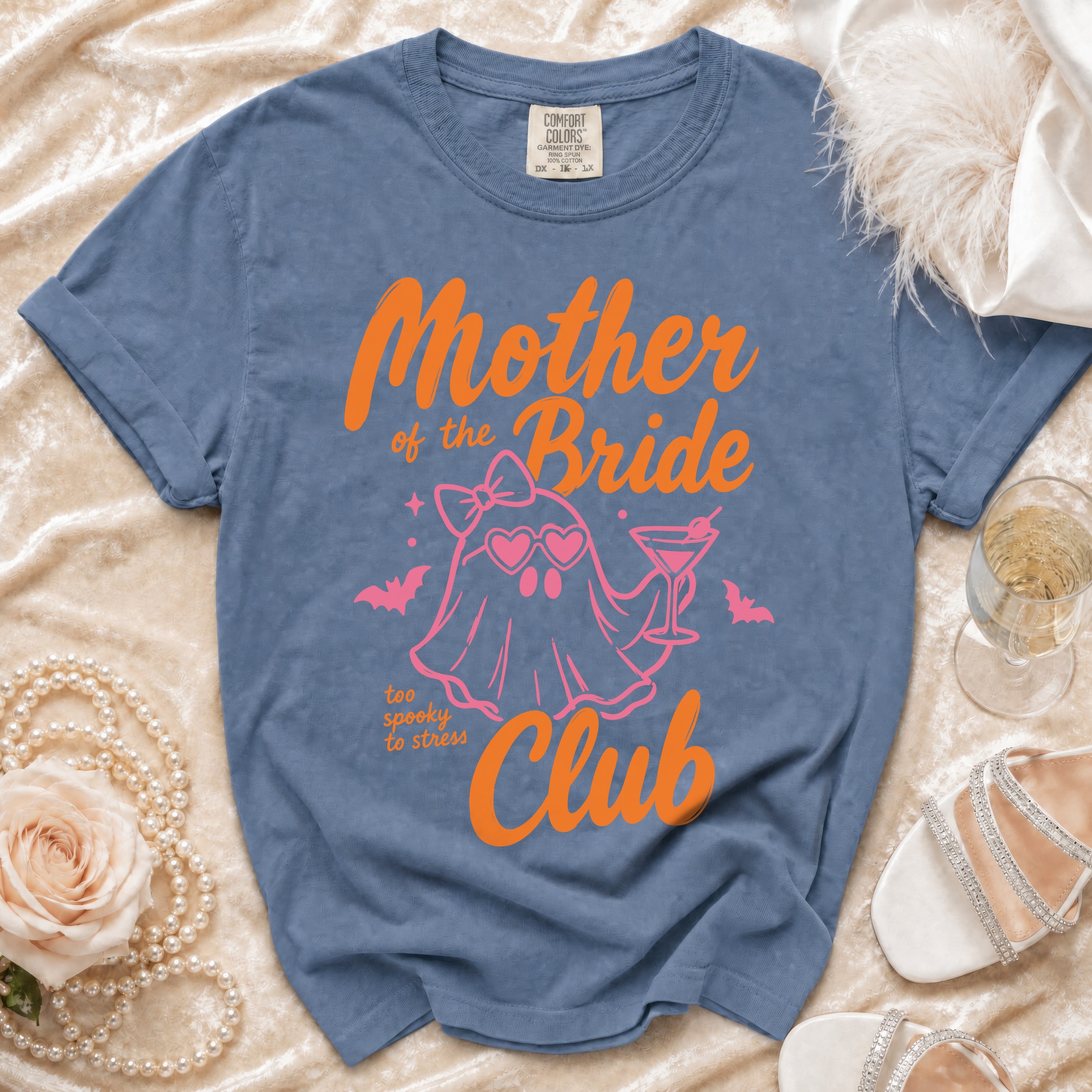 Blue Comfort Colors t-shirt with "Mother of the Bride Club" and ghost graphic.