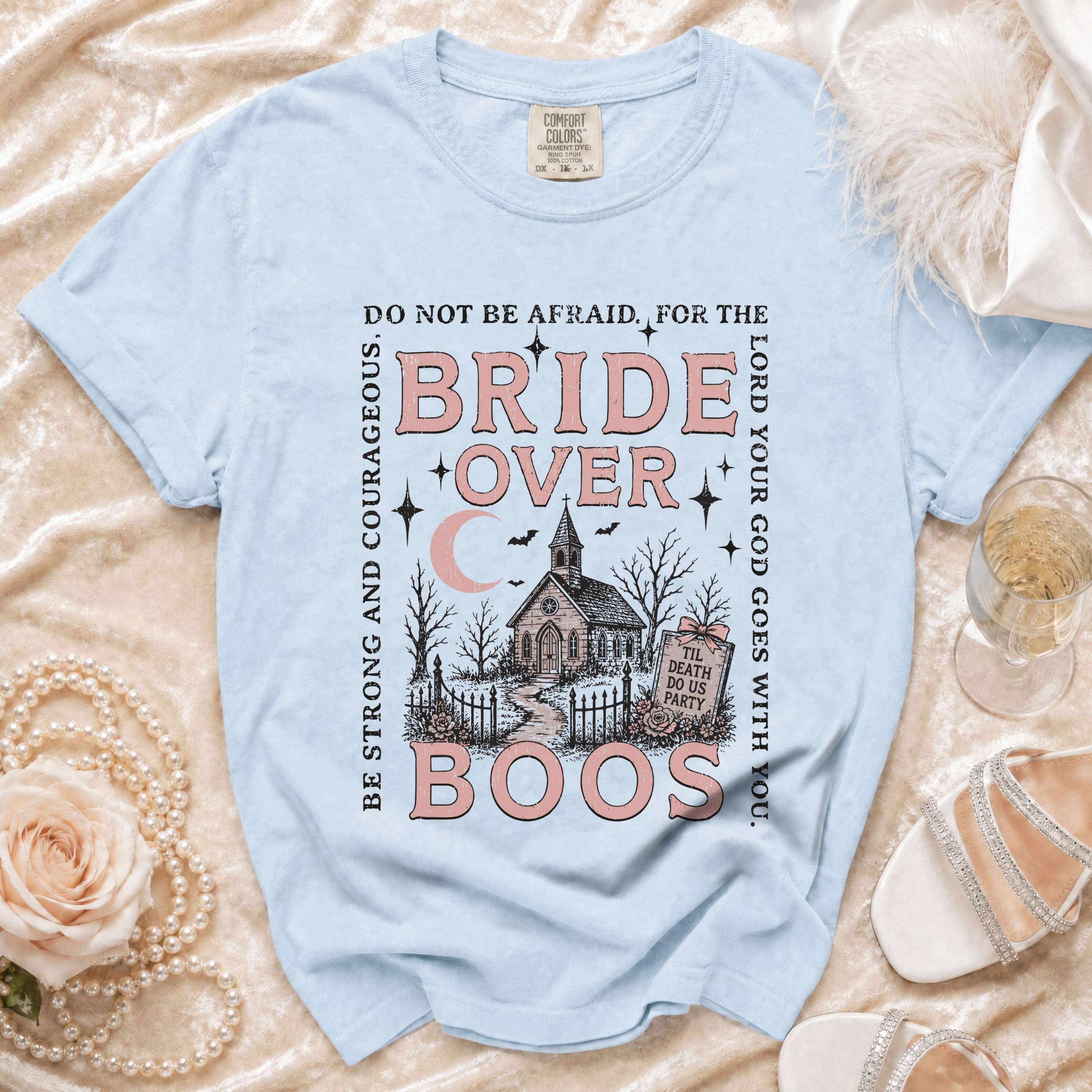 Light blue t-shirt with "Bride Over Boos" graphic and religious text.