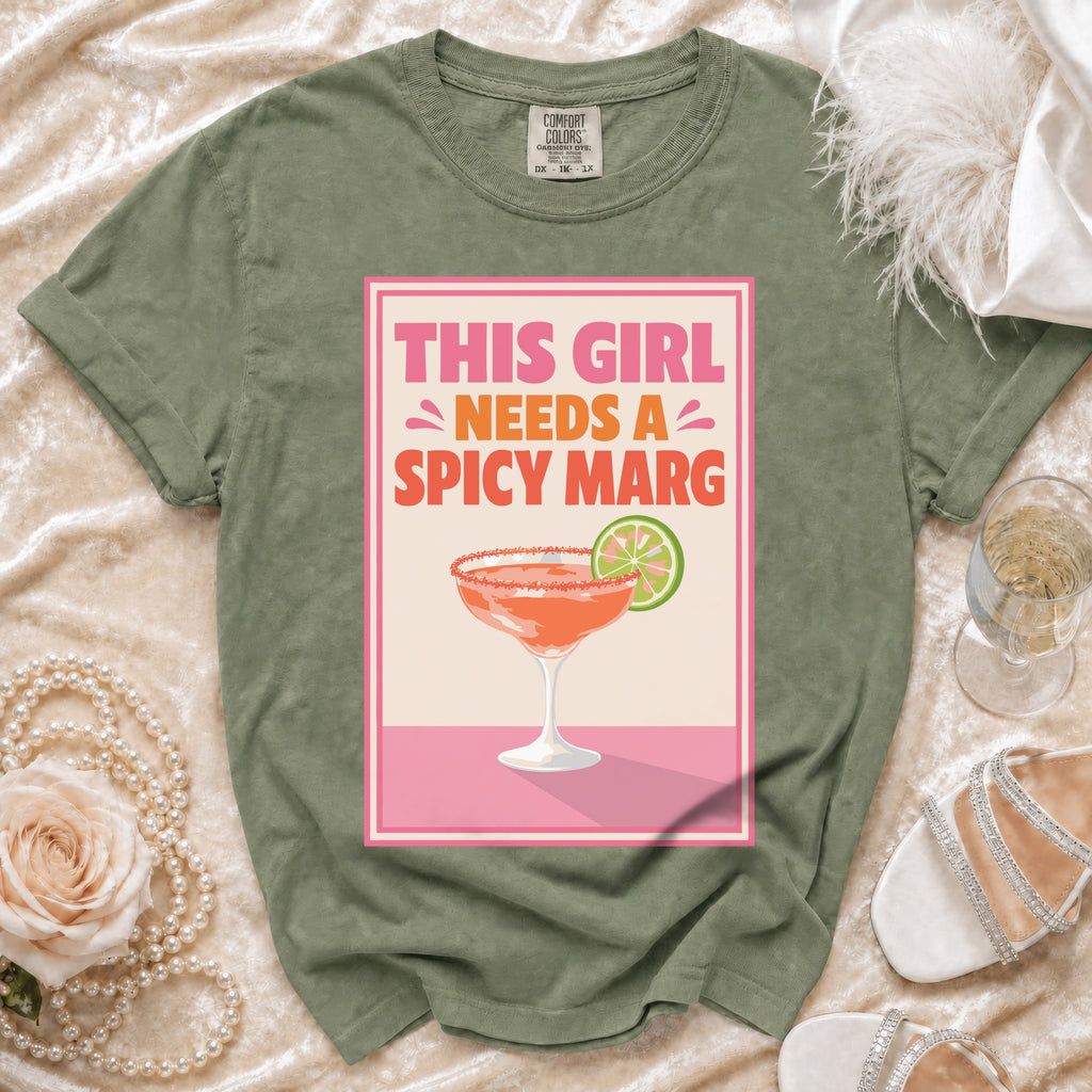 Olive t-shirt with "This Girl Needs A Spicy Marg" graphic and a margarita.