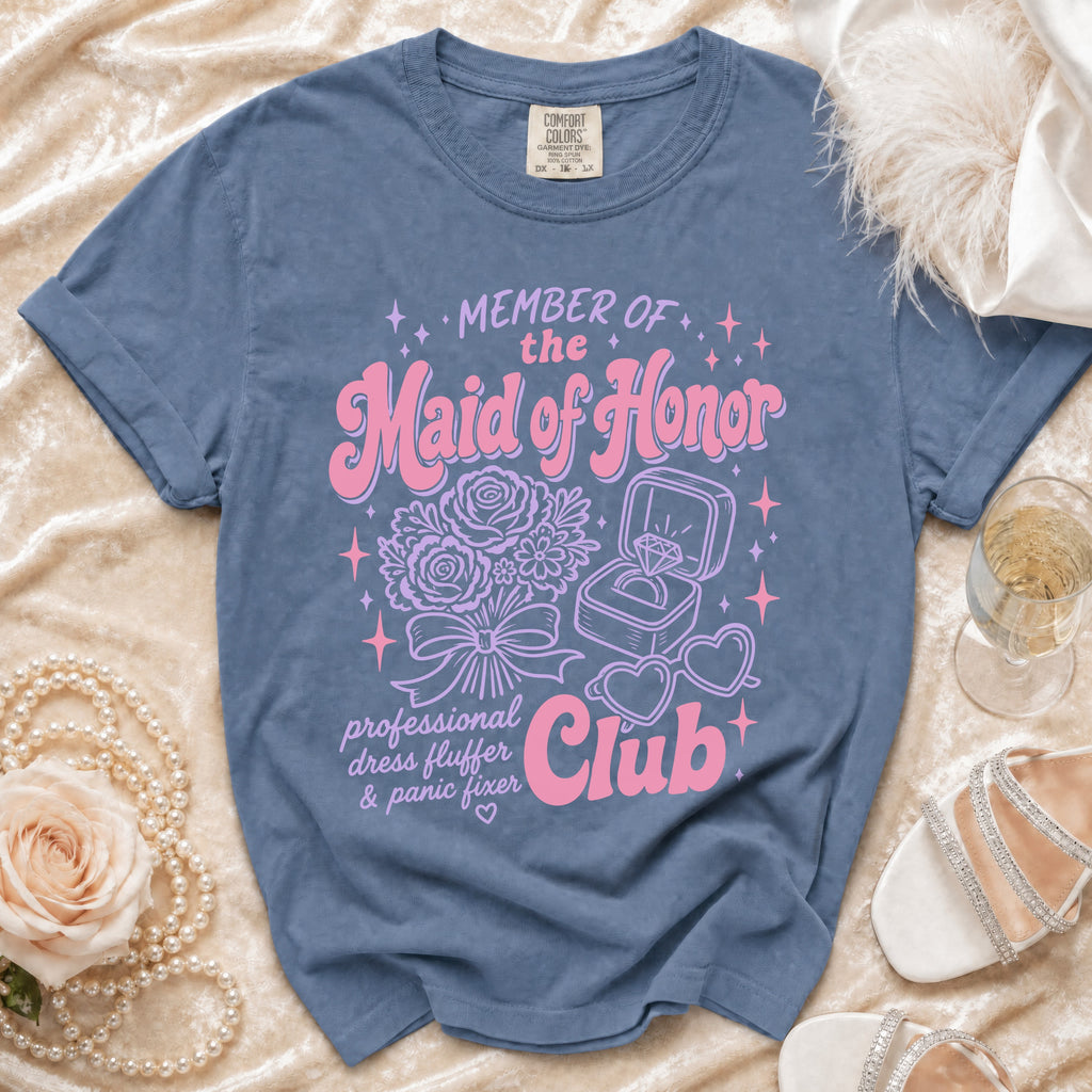 Blue t-shirt with "Member of the Maid of Honor Club" text and graphics.