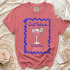 T-shirt with "Last Splash" and beach cocktail graphic.