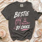 T-shirt with "BESTIE Maid of Honor BY CHOICE" text, champagne glasses, and ring.