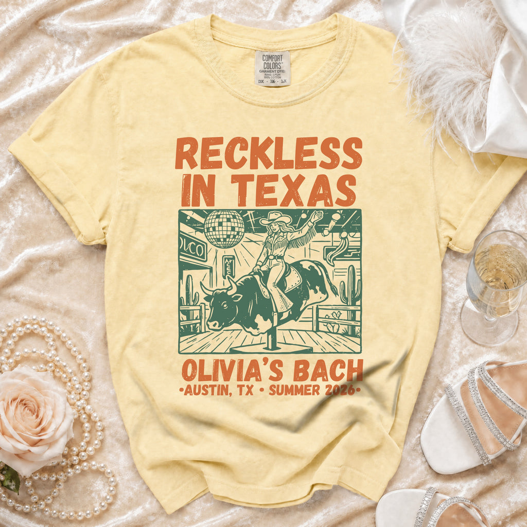 Yellow t-shirt with "Reckless in Texas" and "Olivia's Bach" designs.