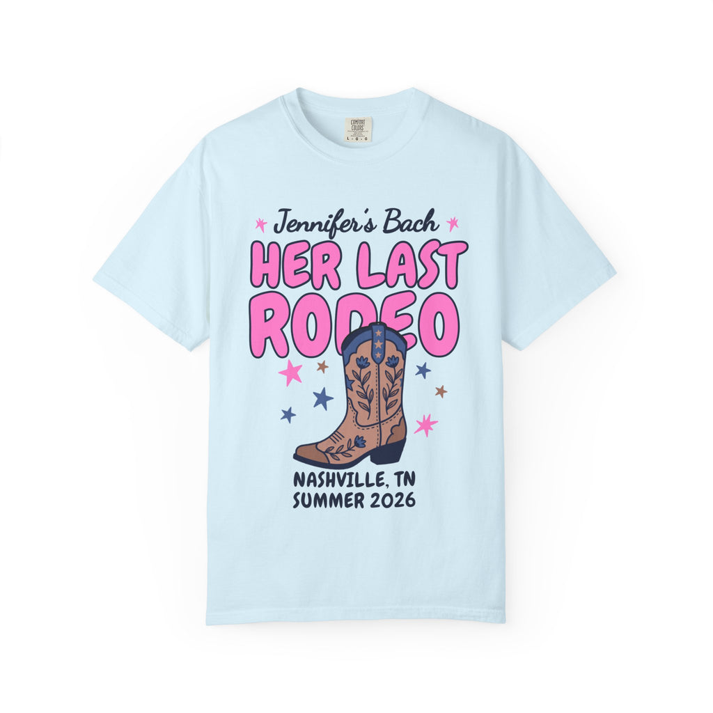 Light blue t-shirt with "Jennifer's Bach Her Last Rodeo" text and a cowboy boot.