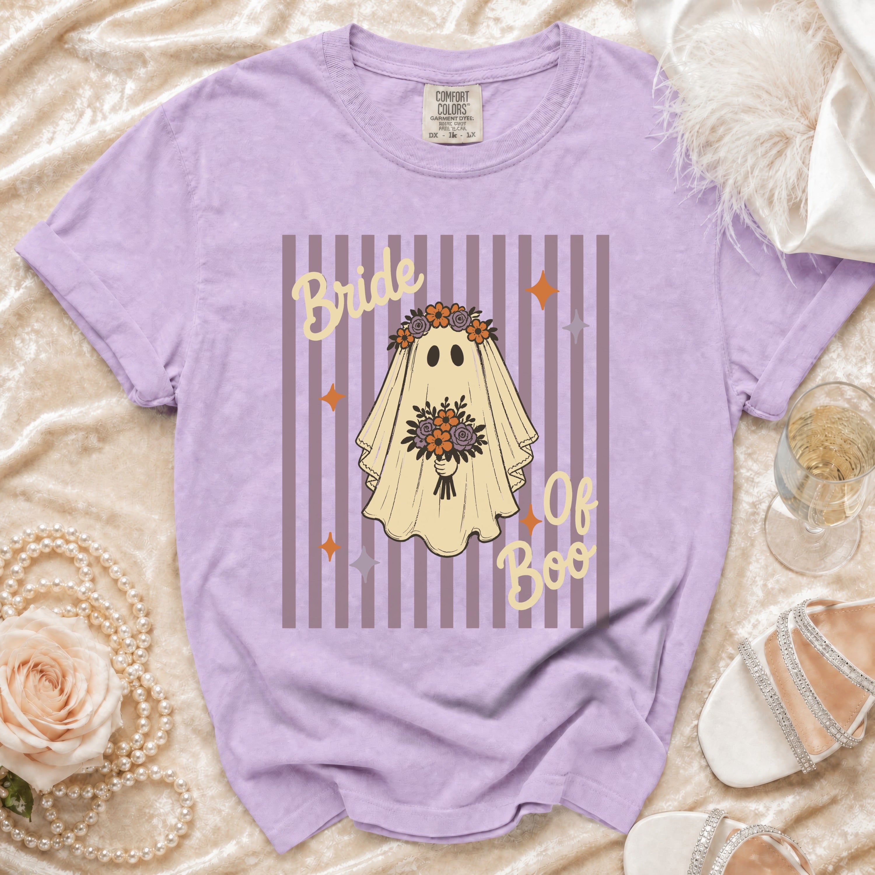 Lavender t-shirt with a ghost graphic that reads "Bride of Boo".
