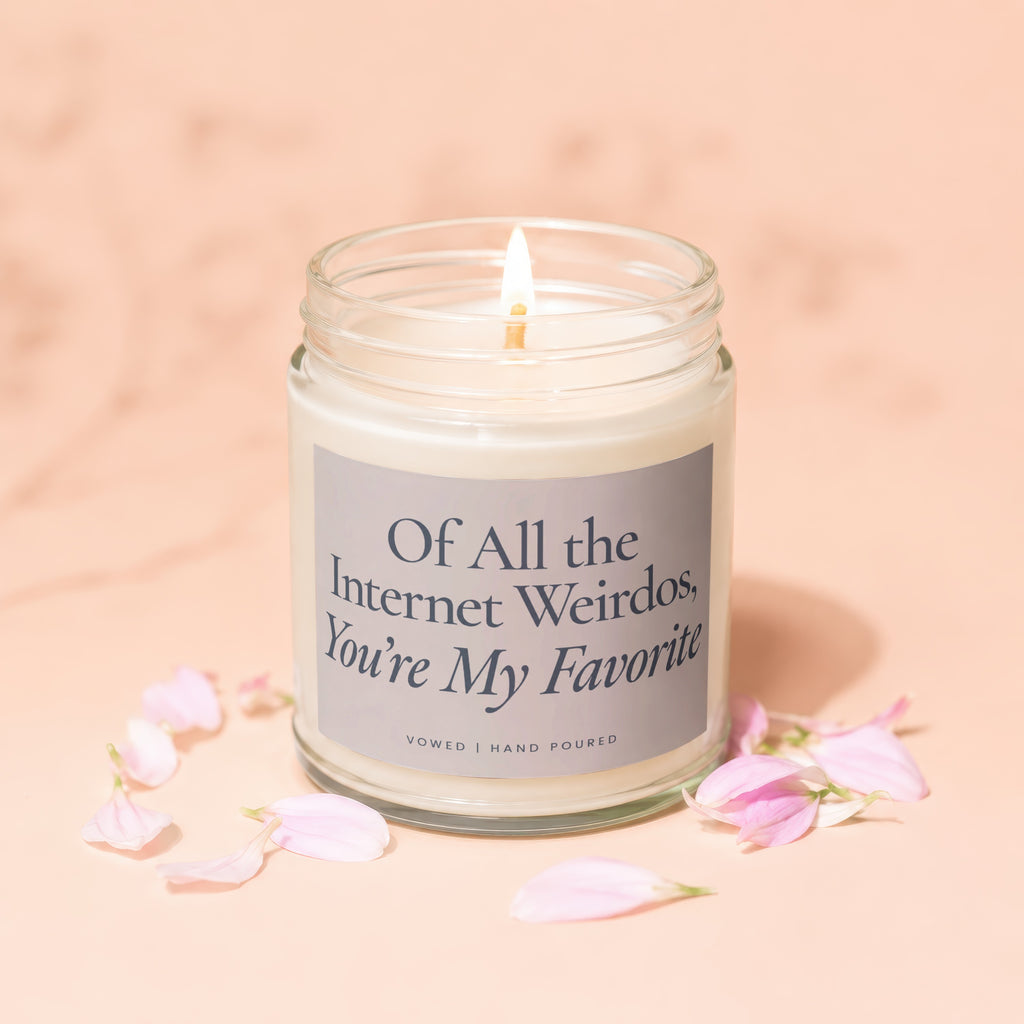 Lit candle in glass jar with label "Of All the Internet Weirdos, You're My Favorite."