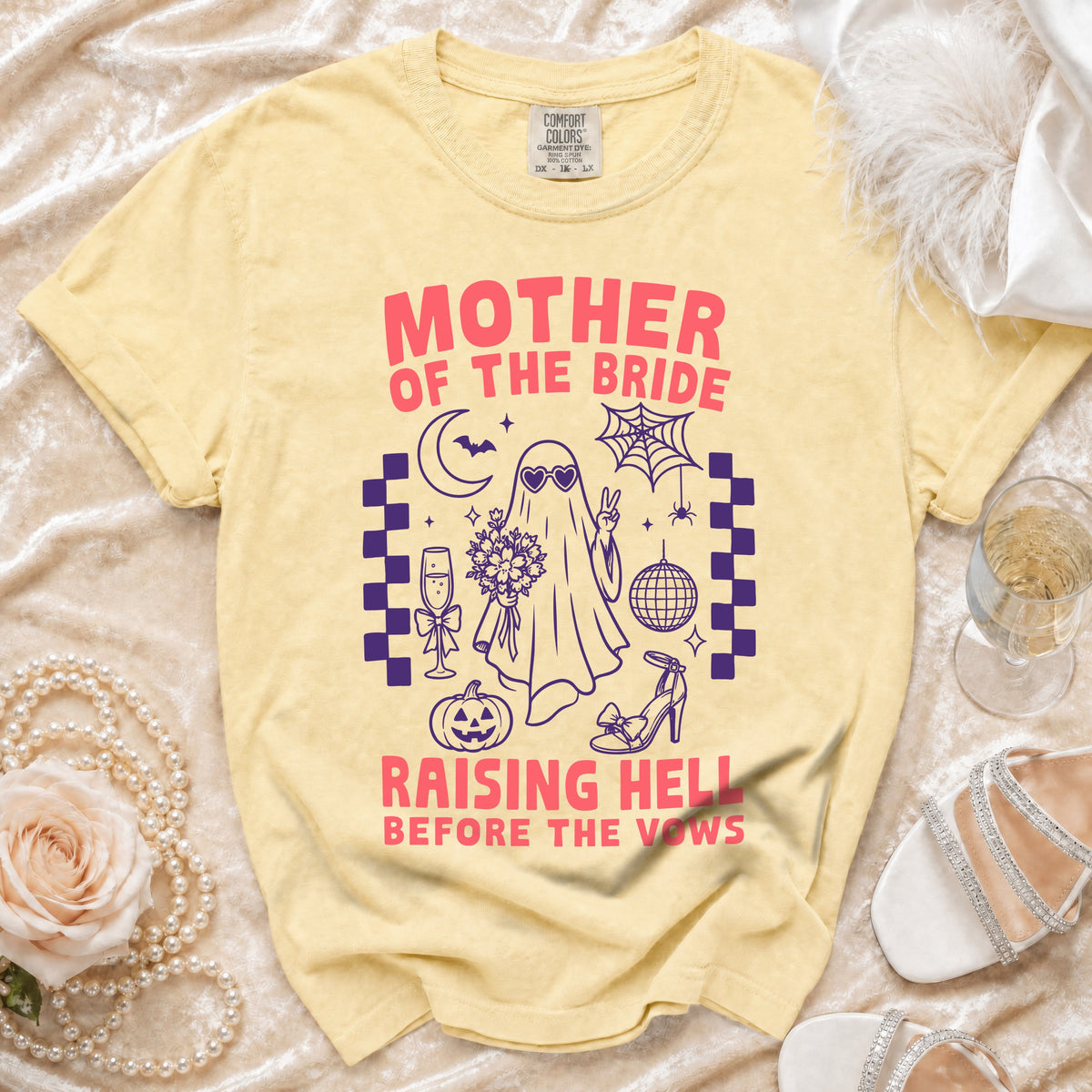 Yellow t-shirt with "Mother of the Bride Raising Hell Before the Vows" graphic.
