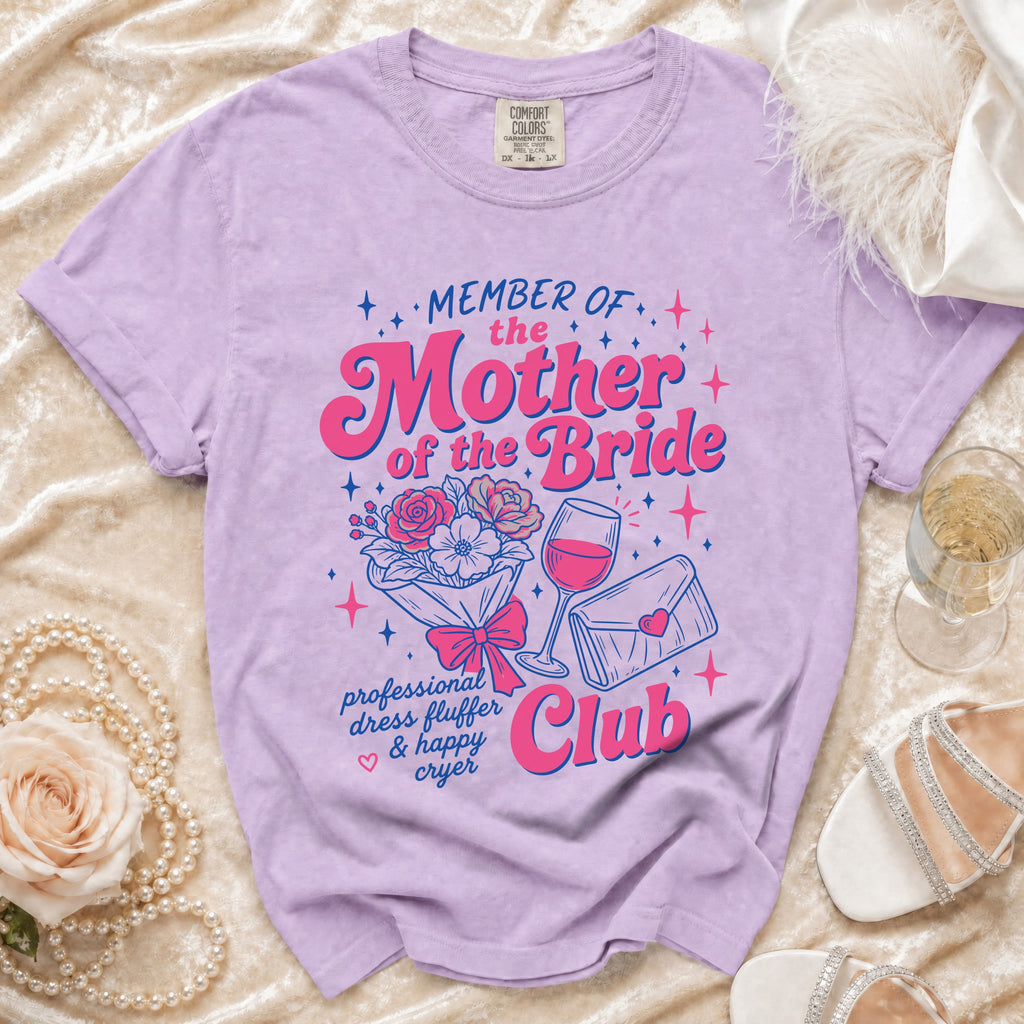 "Member of the Mother of the Bride Club" text on lilac t-shirt with graphic elements.