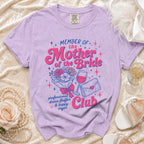 "Member of the Mother of the Bride Club" text on lilac t-shirt with graphic elements.
