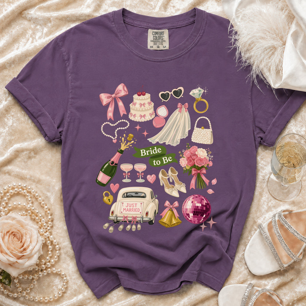 Purple t-shirt with "Bride to Be" text and wedding icons.