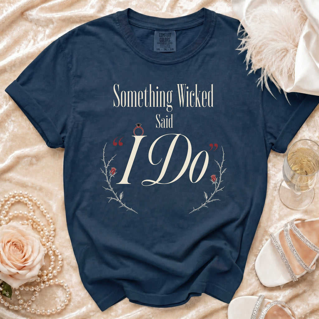 Navy Comfort Colors shirt with "Something Wicked Said I Do" text and floral design.
