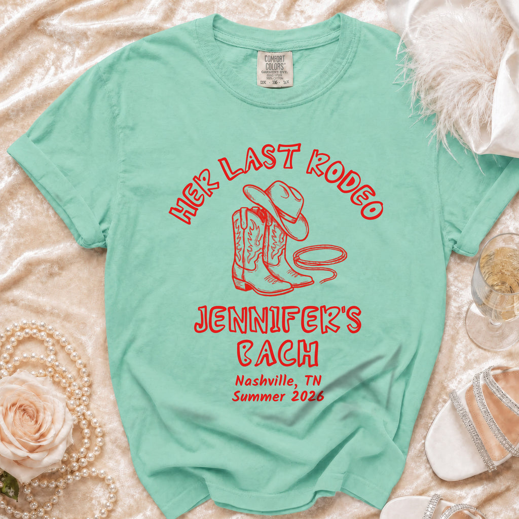 Mint green t-shirt with "Last Rodeo Jennifer's Bach Nashville Summer 2026" text.