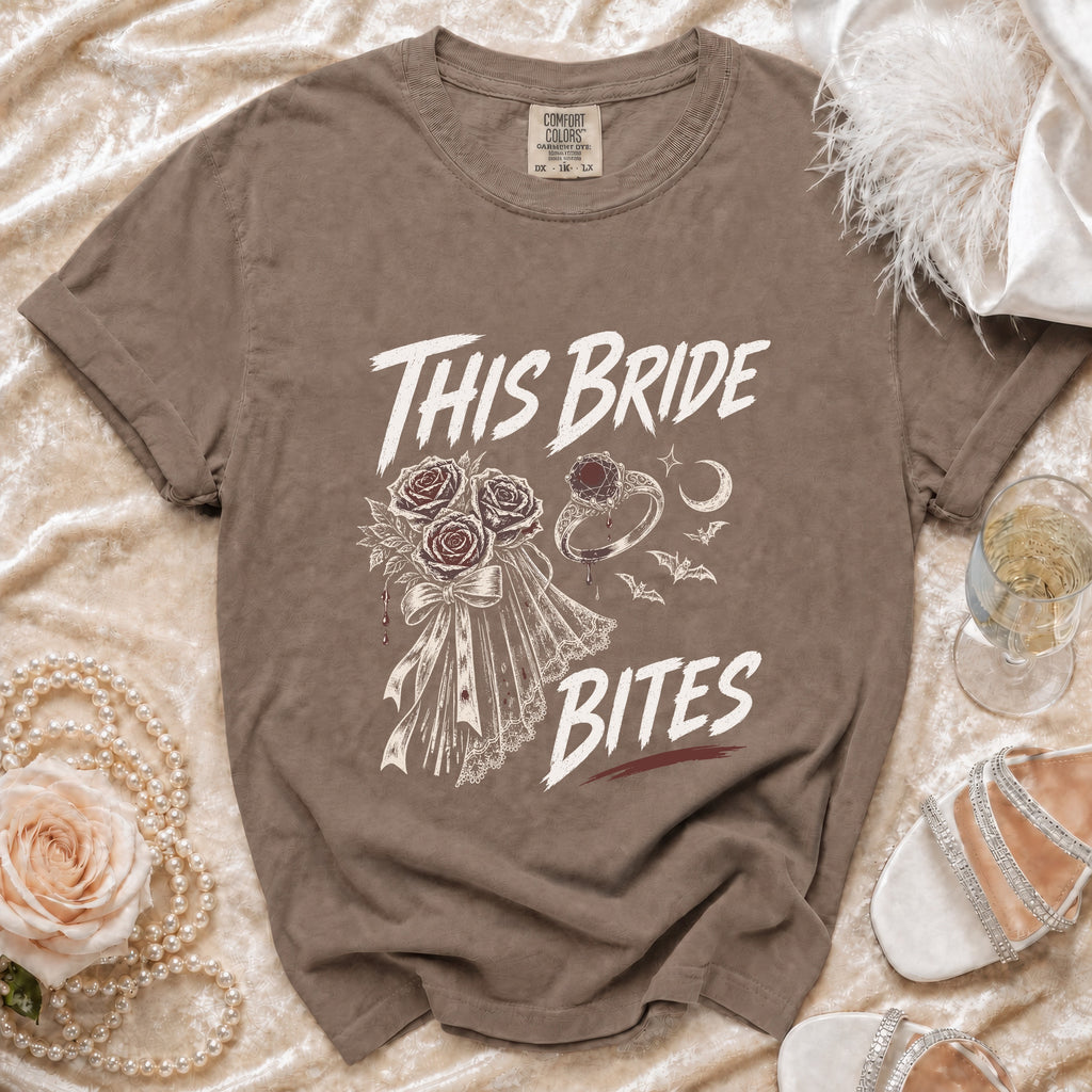 Brown t-shirt with "This Bride Bites" text, roses, ring, and bats graphic.