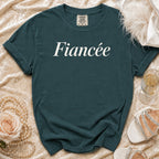 Dark teal t-shirt with "Fiancée" in white script font.