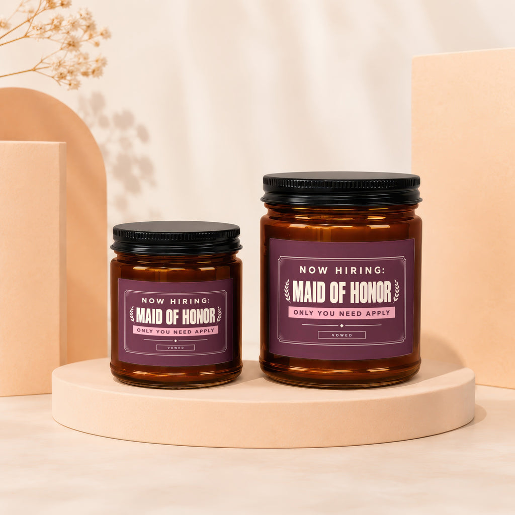 Two amber glass jars with black lids, one smaller than the other, labelled "Maid of Honor".