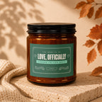 Amber candle with "Love, Officially" label and "Cheers to You Both" text.