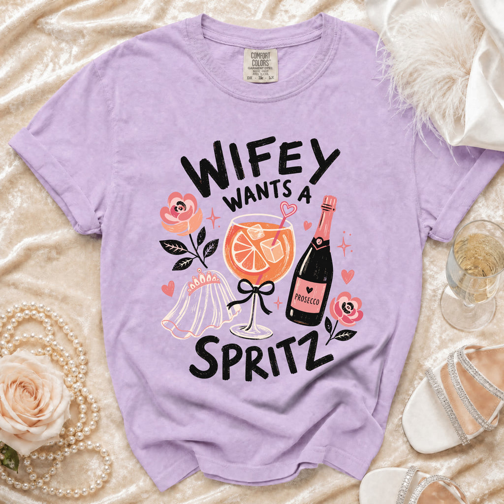 Purple t-shirt with "Wifey Wants a Spritz" text, prosecco, and cocktail.