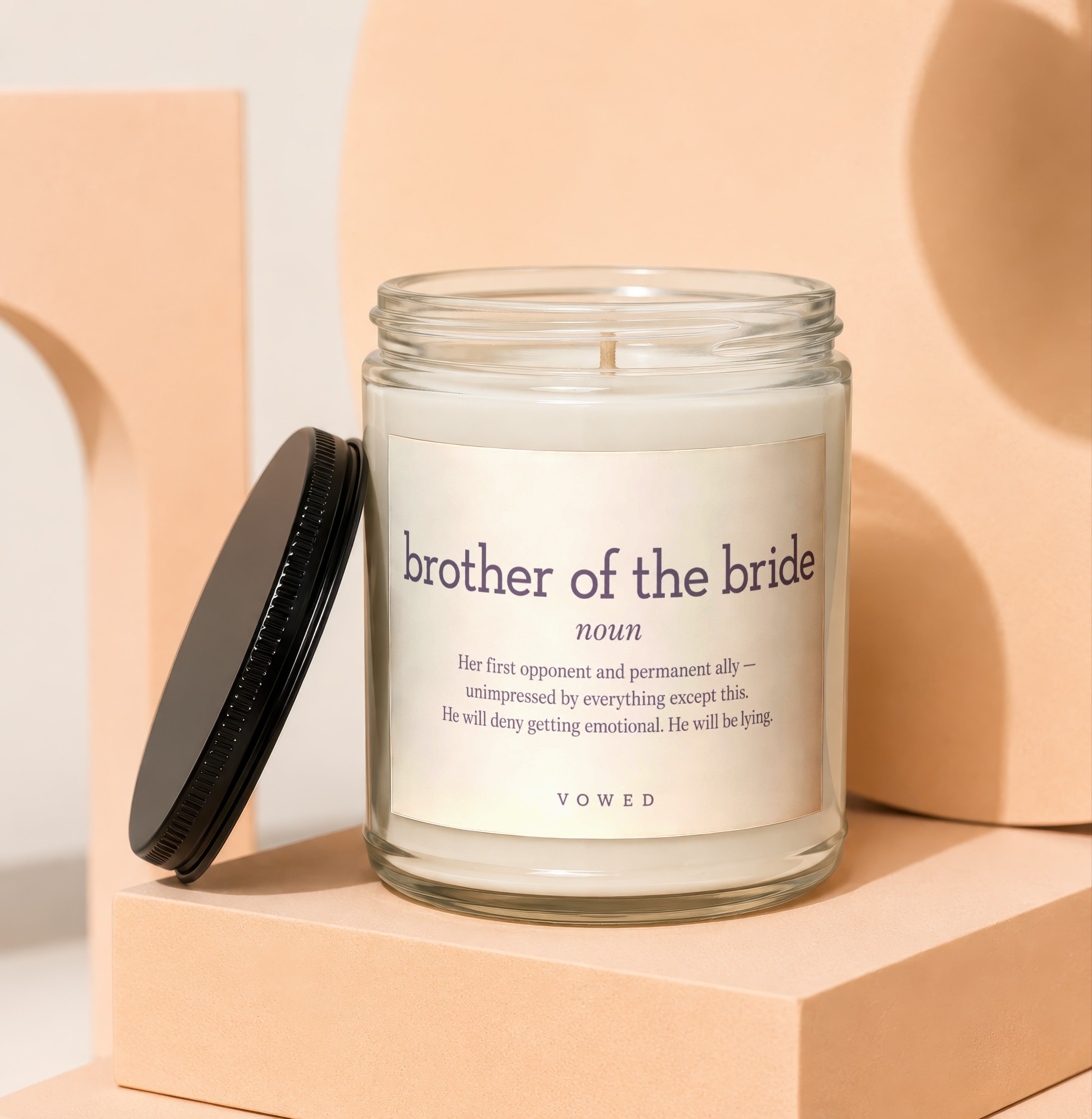 Glass candle with "brother of the bride" definition label.