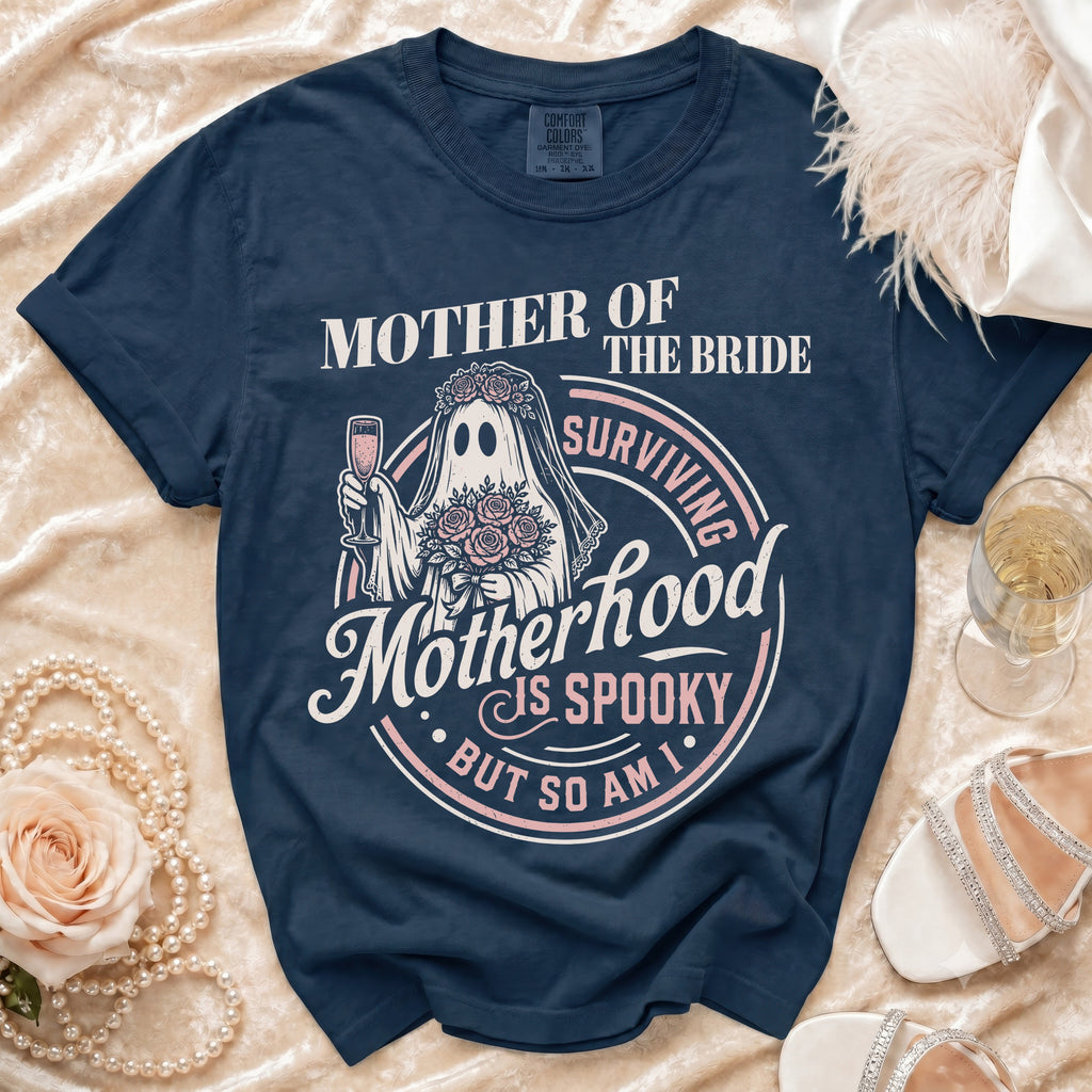 Navy blue t-shirt with "Mother of the Bride, Surviving Motherhood is Spooky But So Am I" graphic.