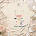 Cream t-shirt with "Maid of Honor, Full-Time, Side Quest, Professional Overthinker, Champagne Coordinator" text.
