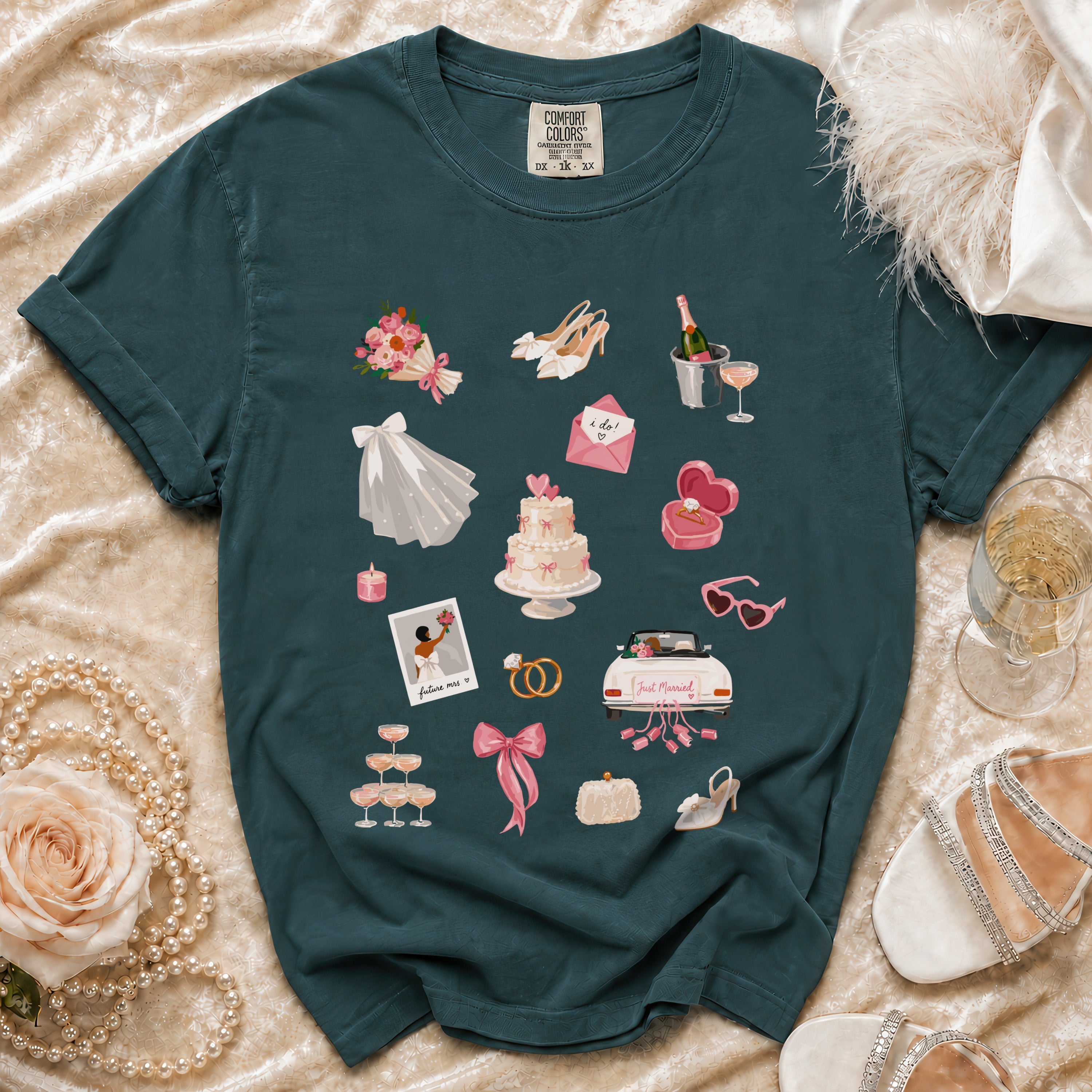 Teal t-shirt with various wedding-themed illustrations and the text "I do!", "future mrs.", and "Just Married".
