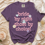 Purple t-shirt with "bride by night ghost by choice!" text and playful graphics.