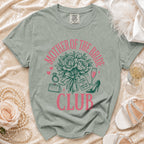 Mother of the Bride Club t-shirt with floral graphics and wedding accessories.