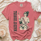 Maid of Honor shirt with a woman popping champagne and text.