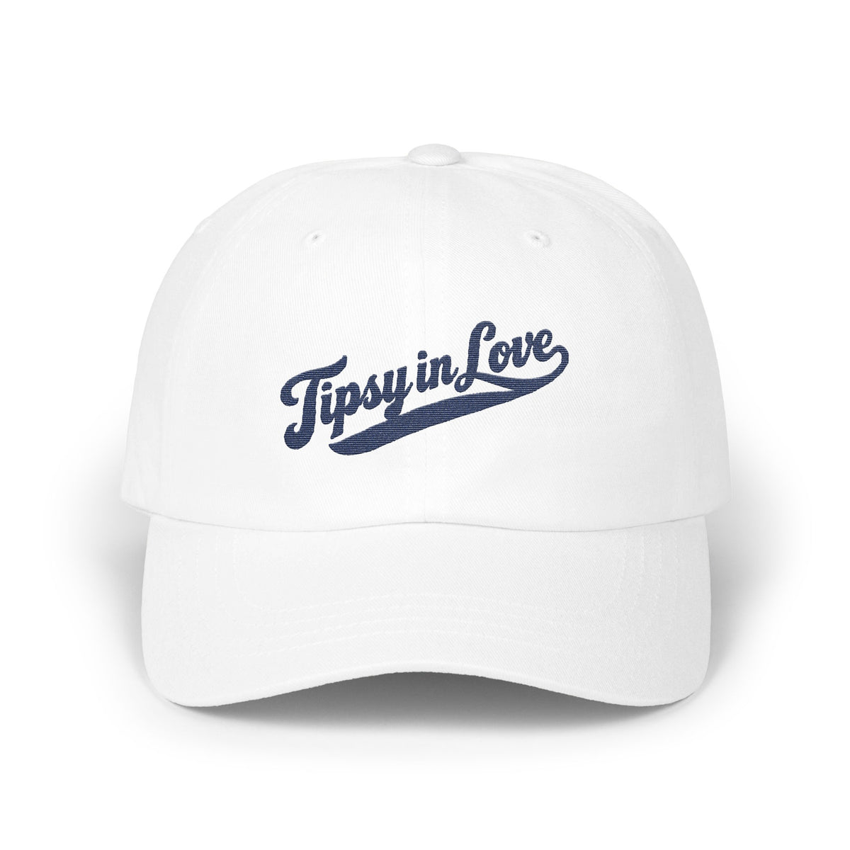 A white baseball cap featuring blue embroidered text that reads Tipsy in Love on the front.