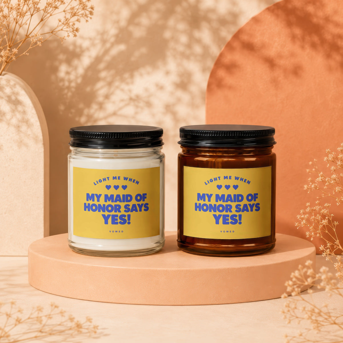 Two candles, one white and one amber, labeled "My Maid of Honor Says Yes!".