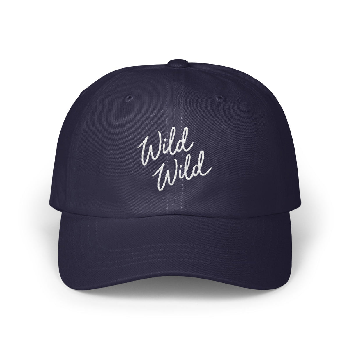 Dark blue baseball cap with white cursive embroidered text reading Wild Wild on the front.