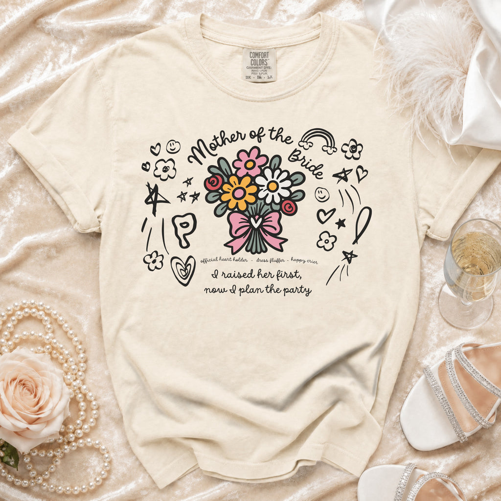 Cream t-shirt with "Mother of the Bride" text and floral bouquet graphic.