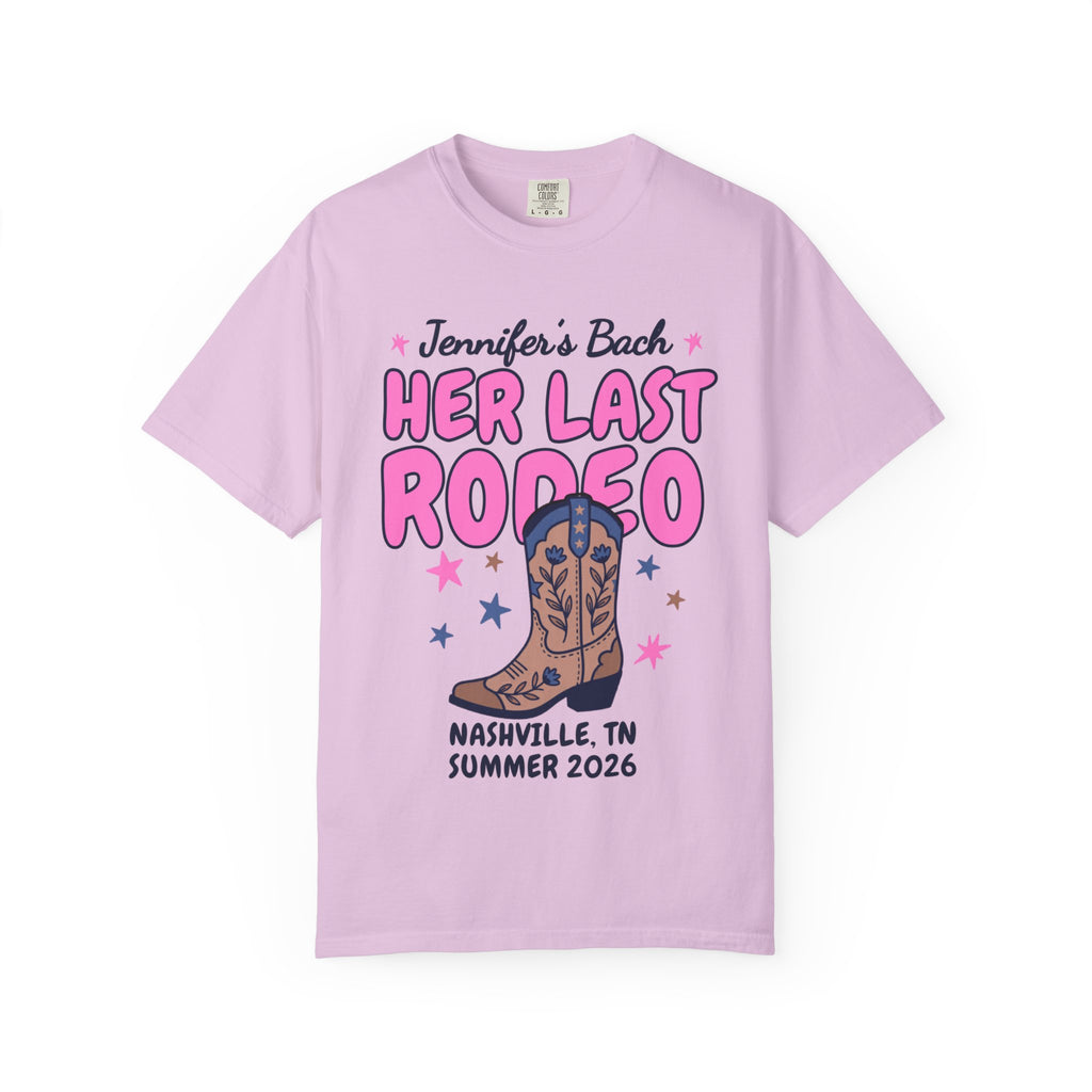 Pink t-shirt with "Jennifer's Bach Her Last Rodeo Nashville, TN Summer 2026" text and cowboy boot.