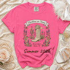 Pink t-shirt with "Reckless in Texas" and "Summer 2026" graphics.
