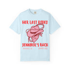 Light blue t-shirt with "Her Last Rodeo" text, cowboy hat, and rope.