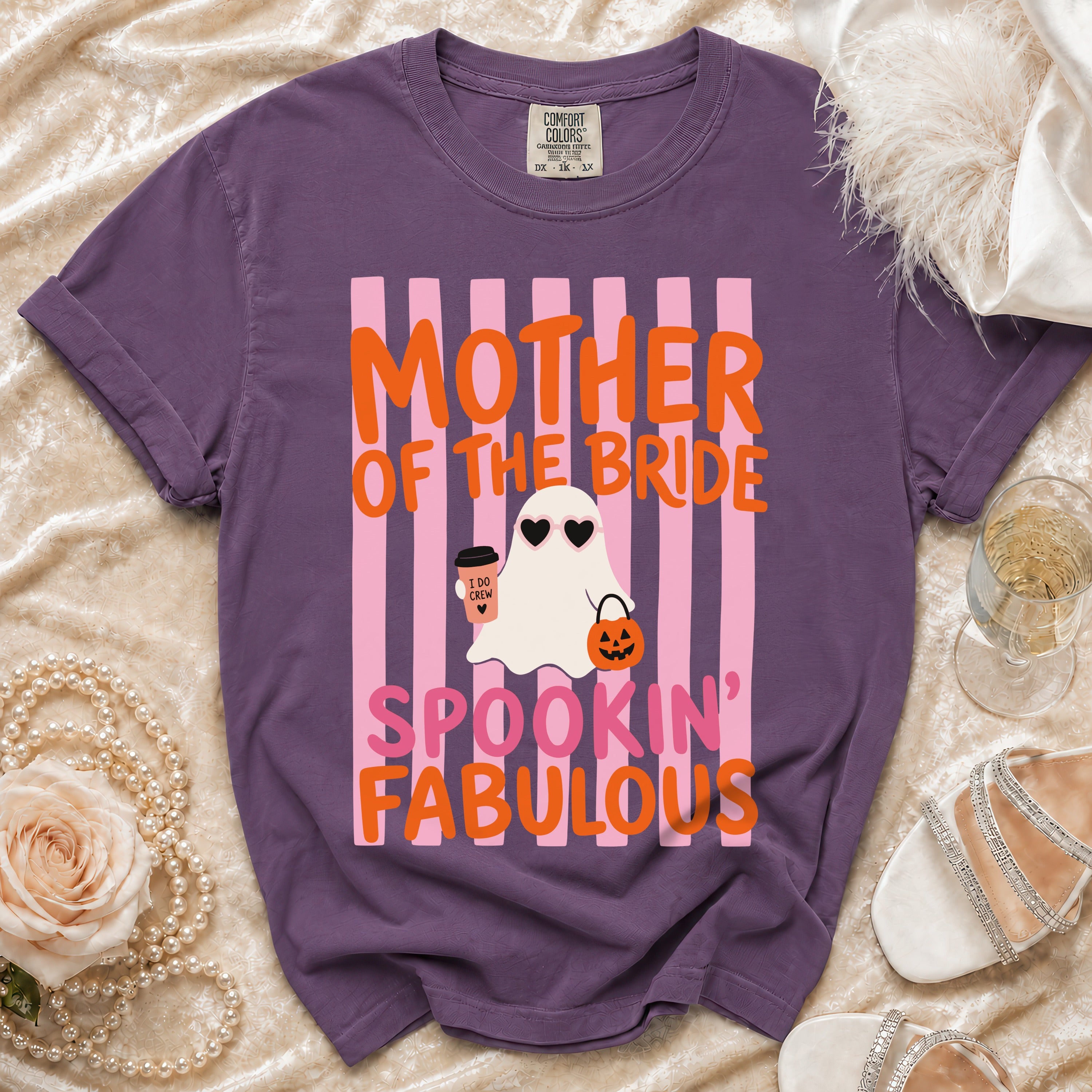 Purple shirt with ghost graphic saying "Mother of the Bride Spookin' Fabulous."