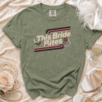 Green t-shirt with "This Bride Bites" graphic featuring a bat and fangs.