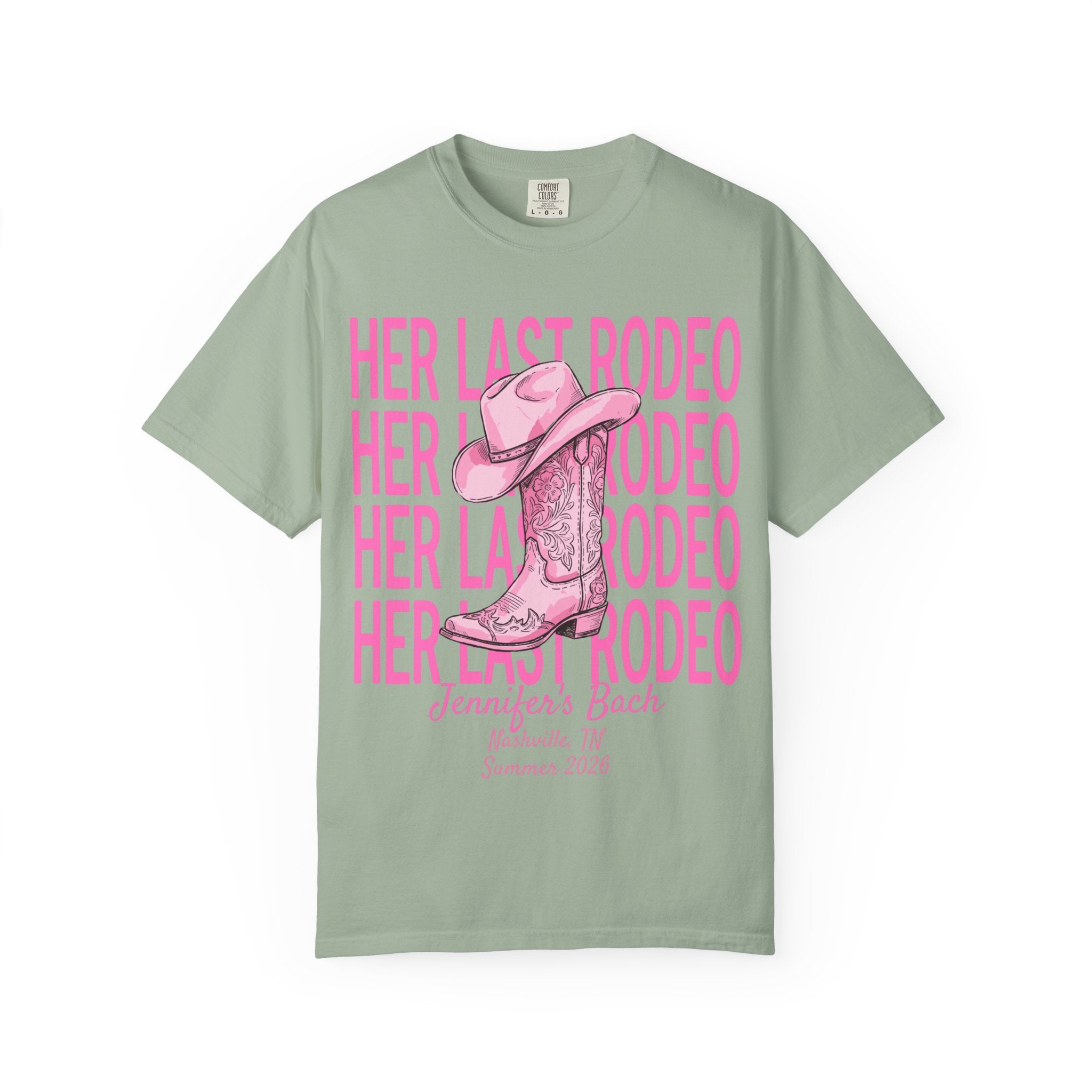 Green t-shirt with pink text "HER LAST RODEO" and cowboy boot graphic.