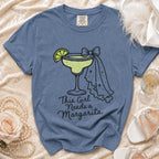 Blue Comfort Colors t-shirt with margarita graphic and text this girl needs a margarita.