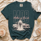 Dark teal crewneck t-shirt featuring a pink ghost bride graphic, vintage car, and Mother of Boo'de text.