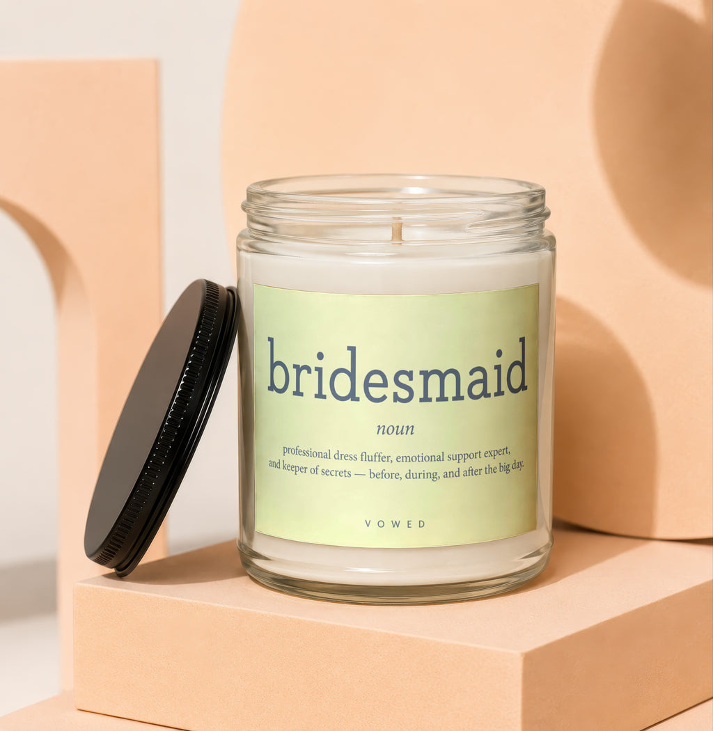 Soy candle with "Bridesmaid" definition label, "Vowed" brand.