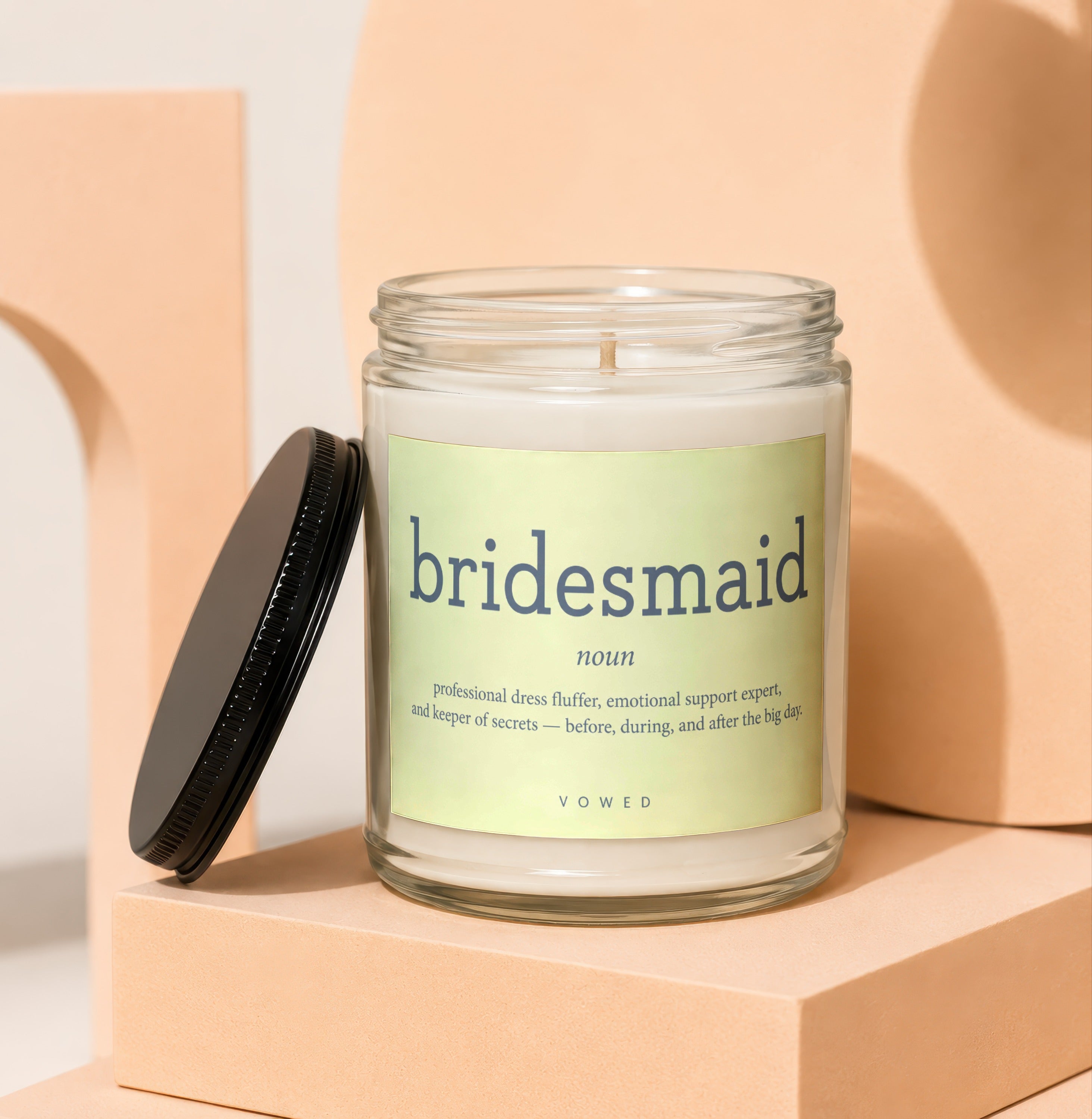 Soy candle with "Bridesmaid" definition label, "Vowed" brand.