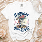 White t-shirt with "Bouquet She Said I Do From Beyond" graphic.