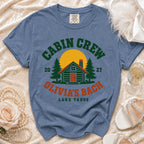 Blue t-shirt with "Cabin Crew Olivia's Bach Lake Tahoe" text and graphics.