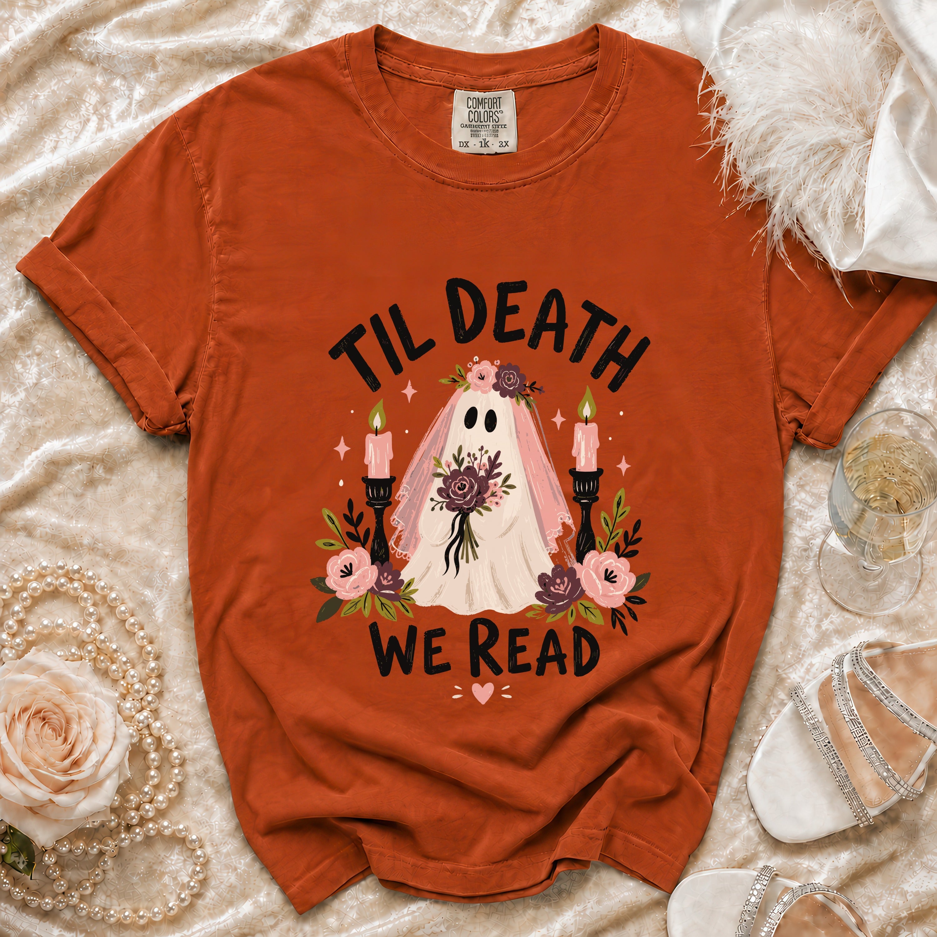 Orange t-shirt with "Til Death We Read" text and a ghost bride illustration.