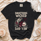 Black t-shirt with "Something Wicked Said 'I Do'" text and skull graphic.